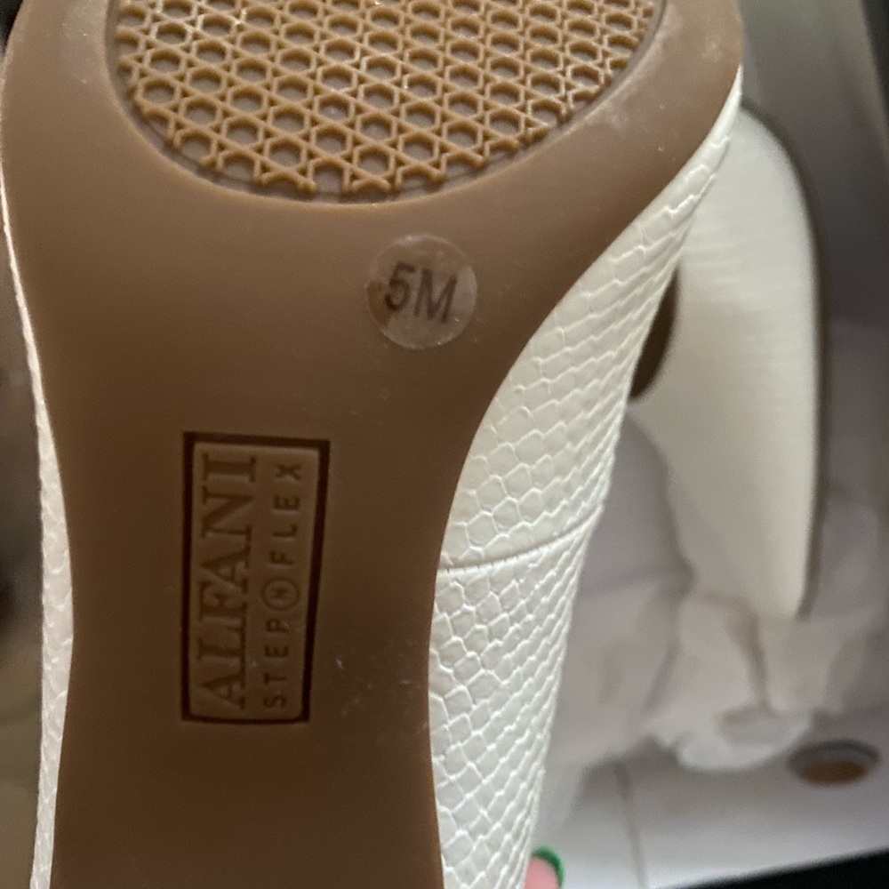 Alfani Jeules White snake heels size 5. Never worn. Heel is approximately 2 1/2.